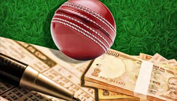rupees beside a cricket bat and ball