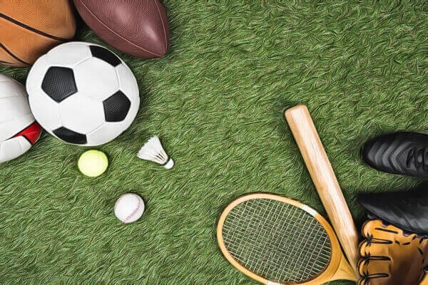 a picture of a basketball, soccer ball, tennis, racket, rugby ball, and a bat