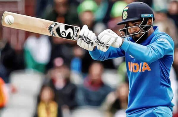 india cricketer batting the ball